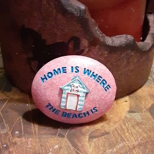 HOME IS WERE THE BEACH IS PEBBLE STONE